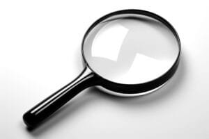 Image illustrant le SEO avec une loupe symbolisant la recherche sur les moteurs de recherche
